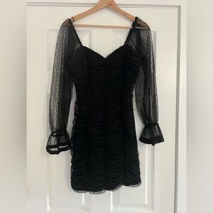 Elegant Black Dress with Sheer Sleeves